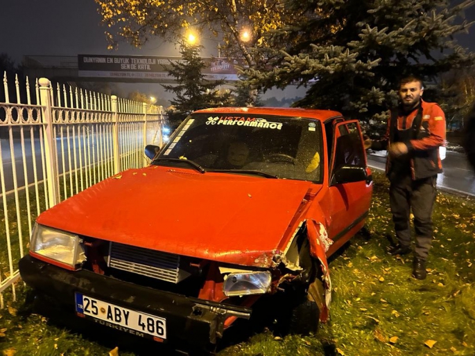 Islak zeminde kayarak refüje çıktı